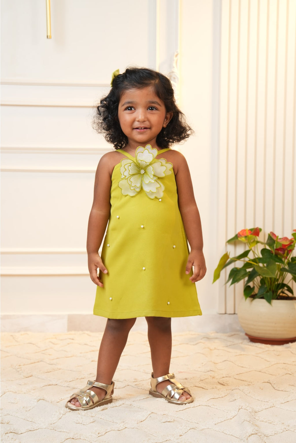 Green strap dress with embroidered flower