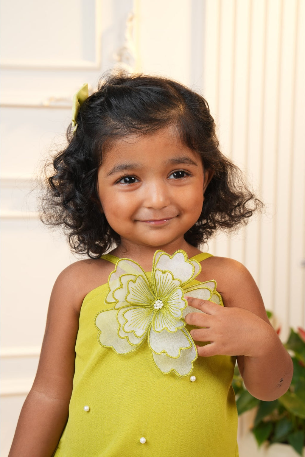 Green strap dress with embroidered flower