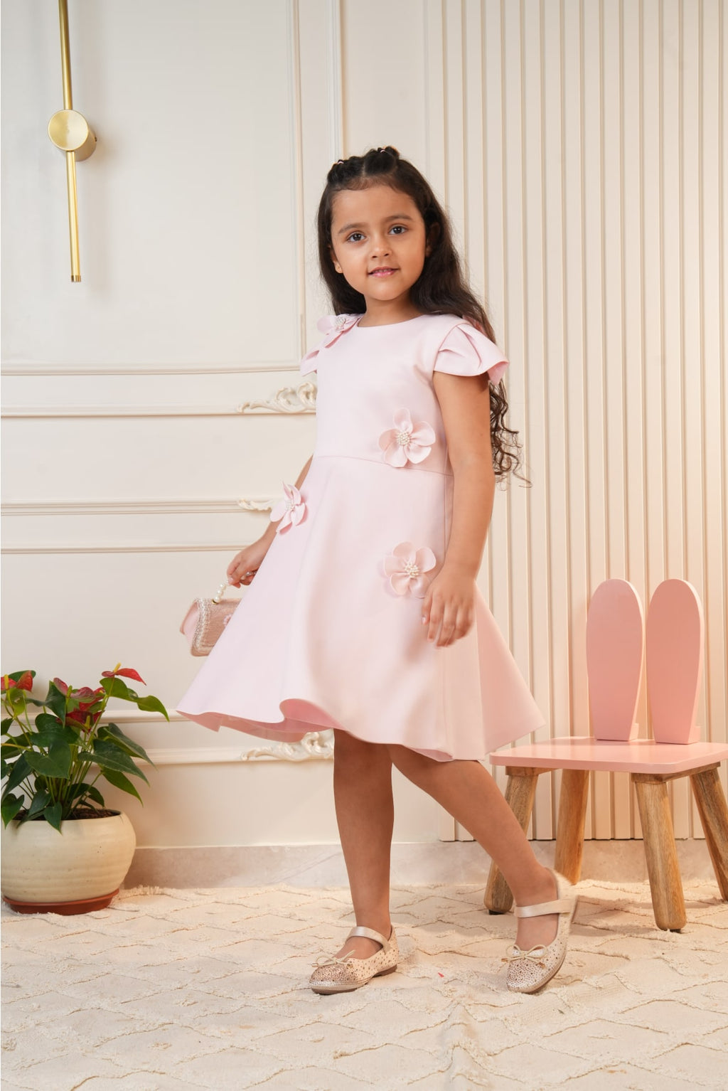 Pink dress with embroidered flowers