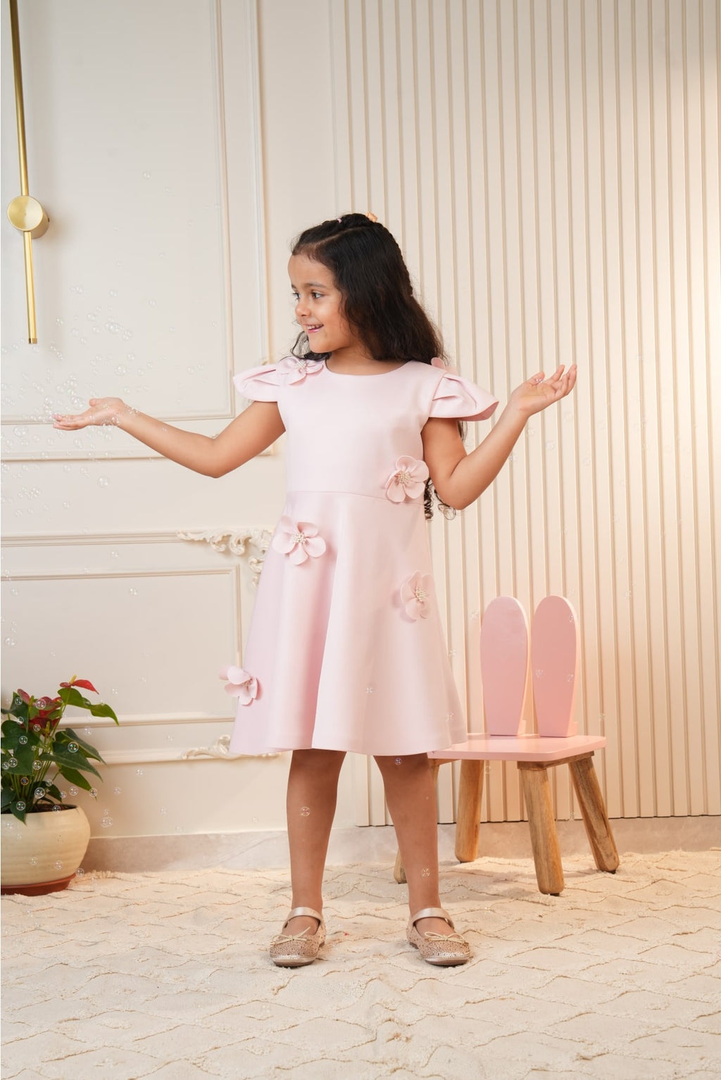 Pink dress with embroidered flowers
