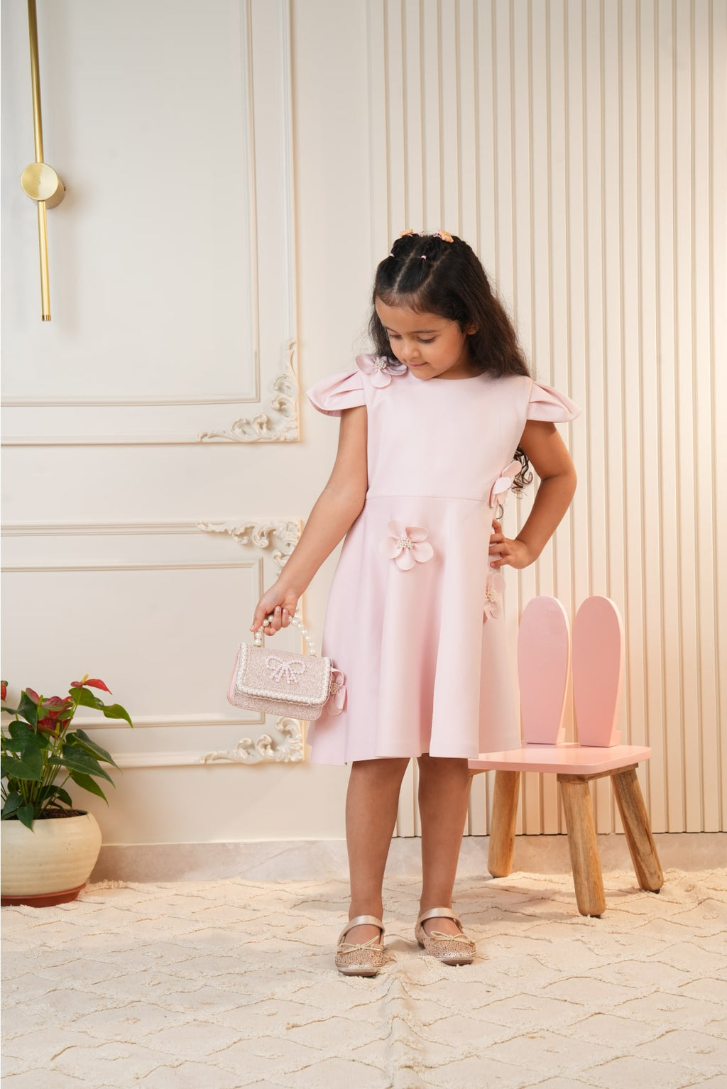 Pink dress with embroidered flowers