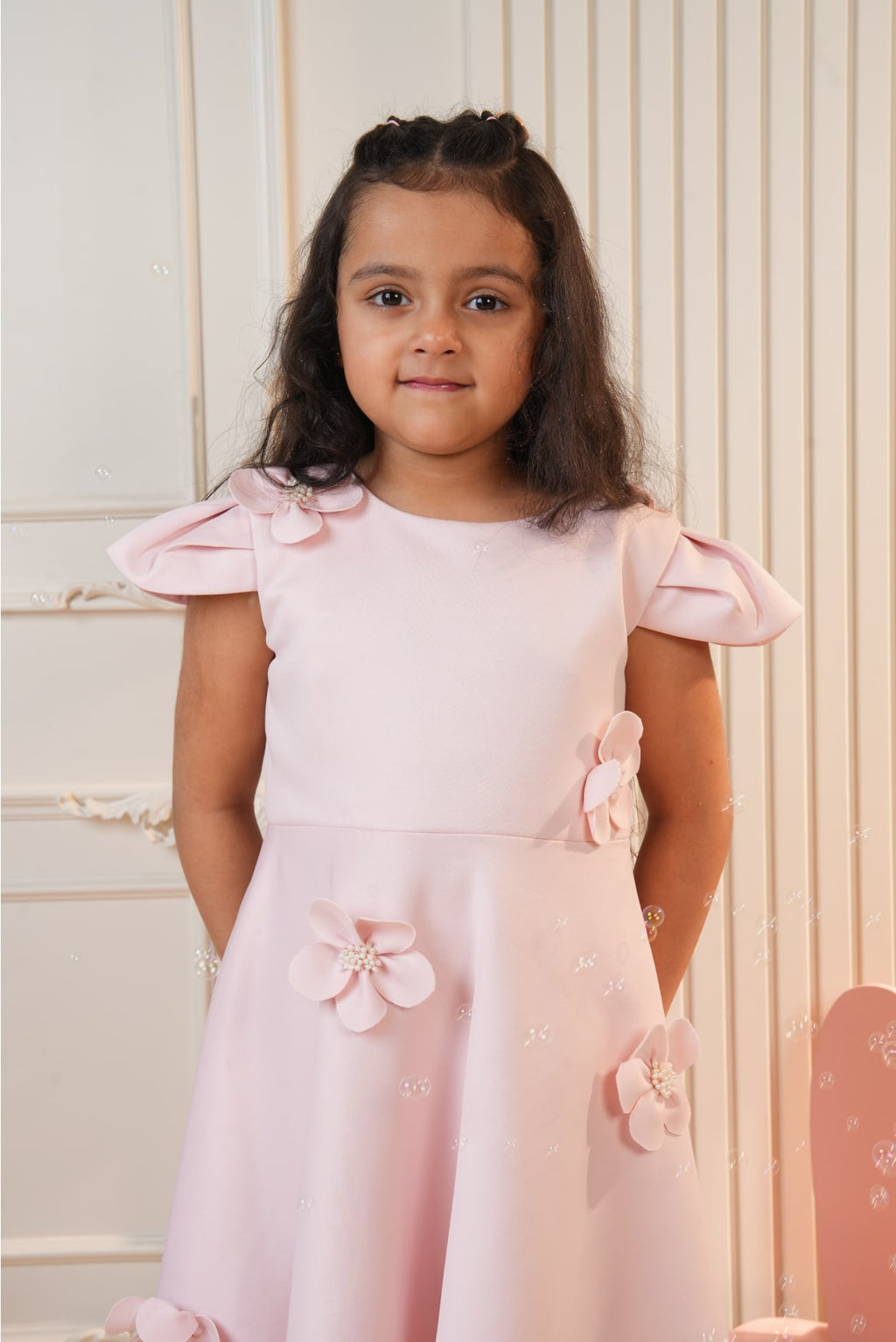 Pink dress with embroidered flowers