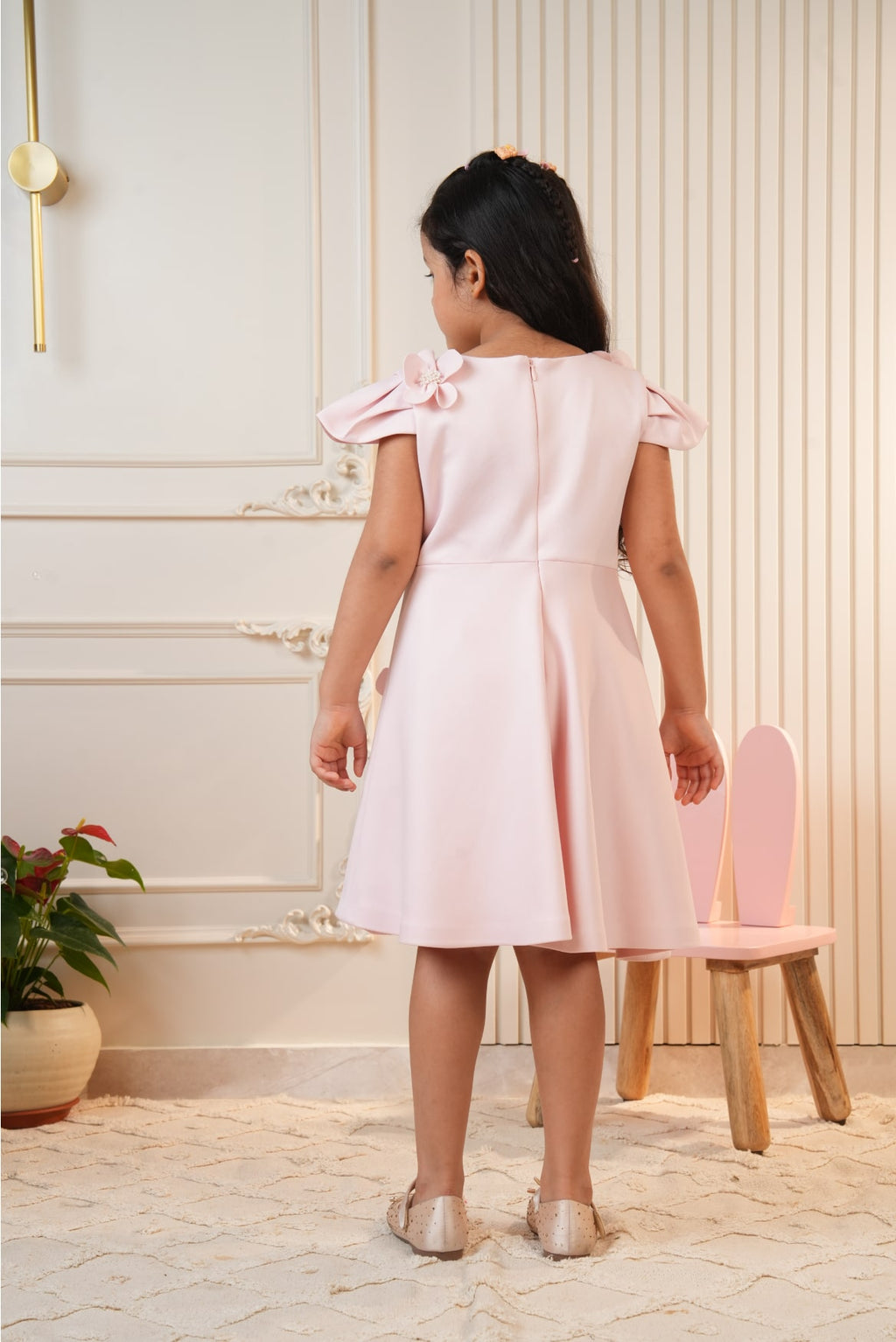 Pink dress with embroidered flowers