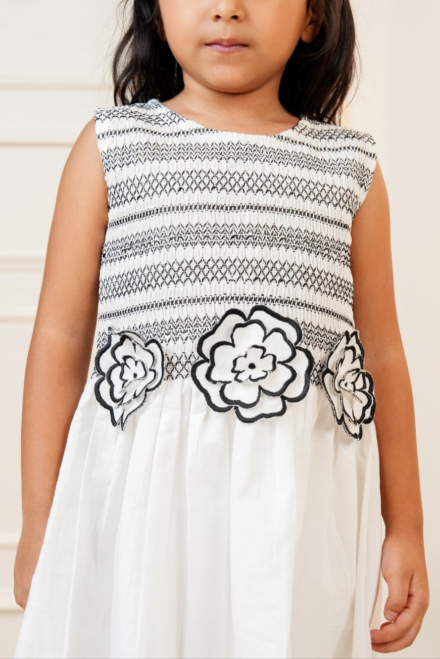 White smocked embroidered dress